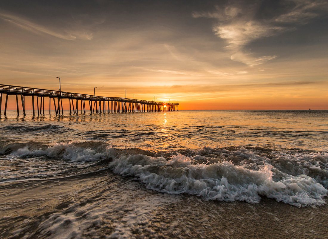 About Our Agency - Dramatic Seascape Image of Virginia Beach in Summer